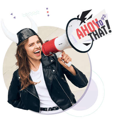 Woman in a horned helmet shouts through a megaphone with “Ahoy to that!” text, wearing a black leather jacket